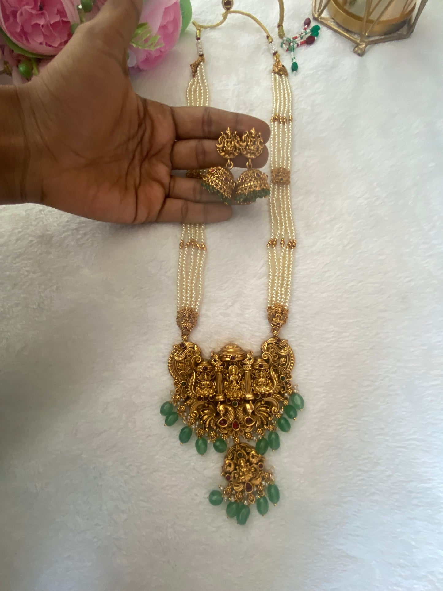 Premium white pearls lakshmi haram with green beads