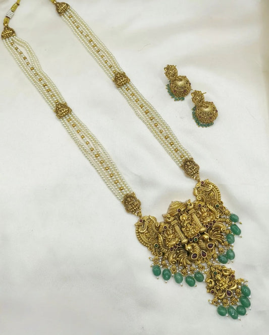 Premium white pearls lakshmi haram with green beads